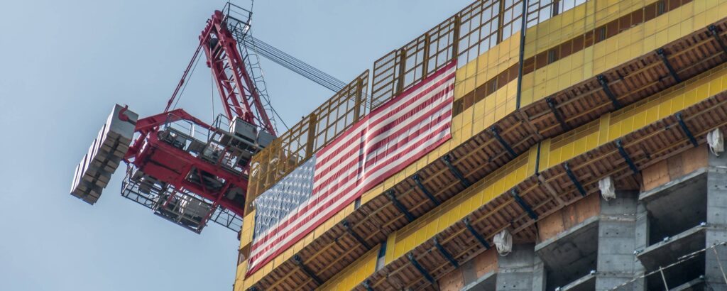 Construction building with flag.