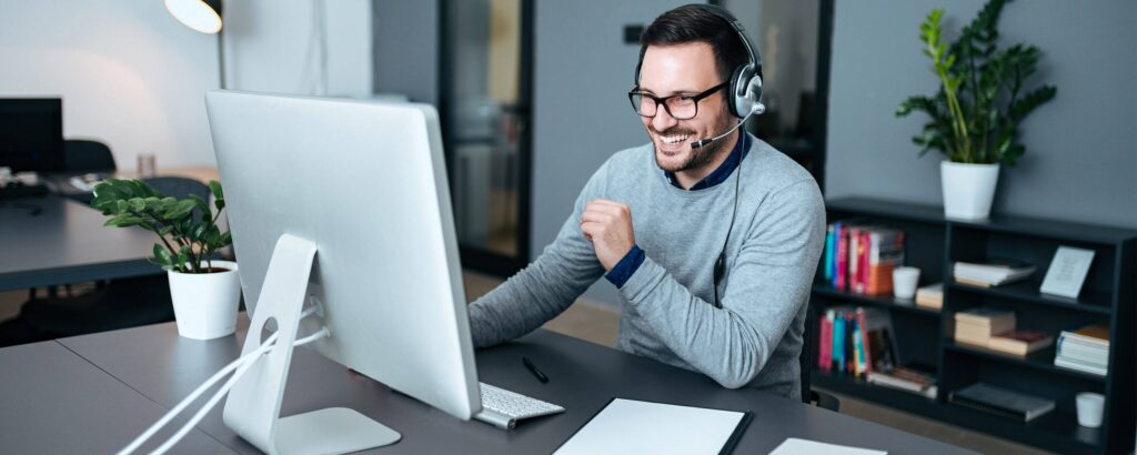 Man sitting in front of laptop.